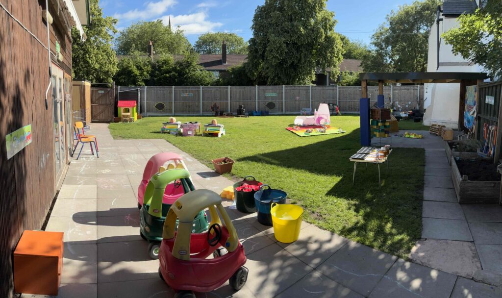 Crow Kids Day Nursery Outdoor Garden with activities set up for children and their visiting families